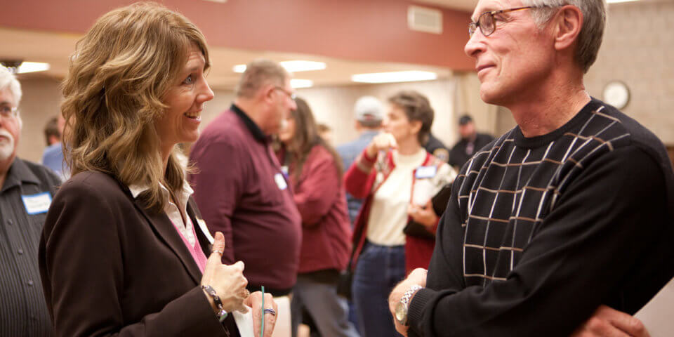 Jeff Frey, Mankato and Wells Oct. 2009 Becky Adams speaking with people Blandin Fd 0171
